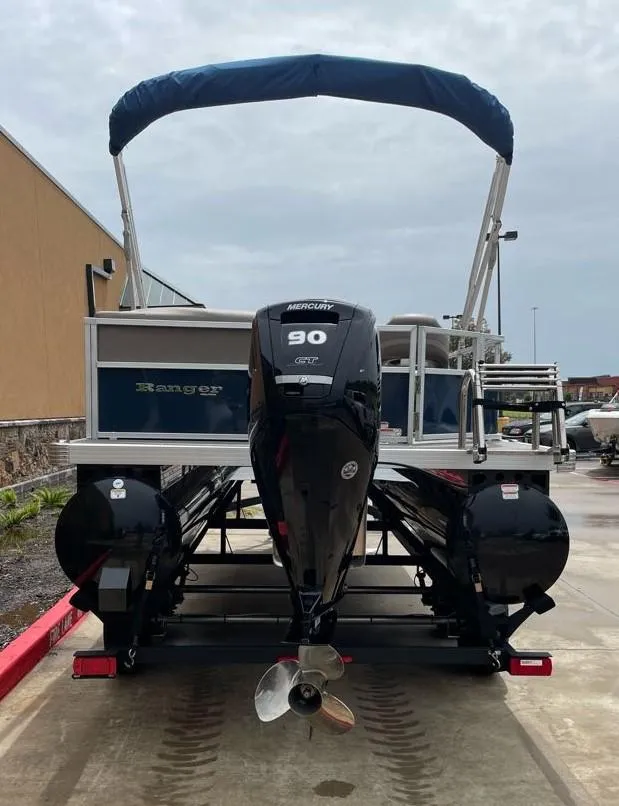 Slide: The Image of 2024 Ranger Reata 200C pontoon boat with Mercury 90 HP outboard motor. - 3