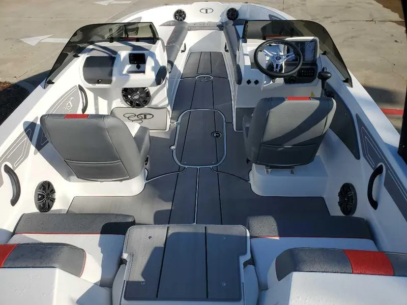 Slide: The Image of 2024 Tahoe T21 boat interior with gray and white seating. - 3