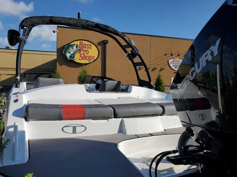 Slide: The Image of 2024 Tahoe T21 boat at Bass Pro Shops with Mercury engine. - 5
