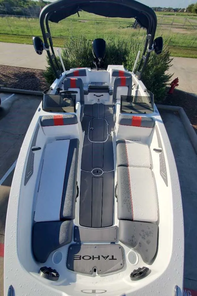 Slide: The Image of 2024 Tahoe T21 boat with spacious seating and modern design. - 6