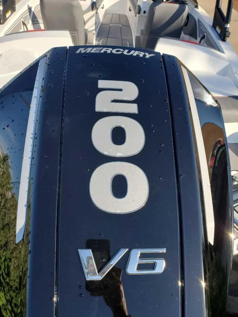 Slide: The Image of 2024 Tahoe T21 boat with Mercury 200 V6 engine. - 8