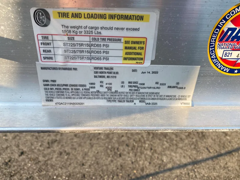 Slide: The Image of Tire and loading information label on a 2022 NauticStar 191 Hybrid boat. - 4