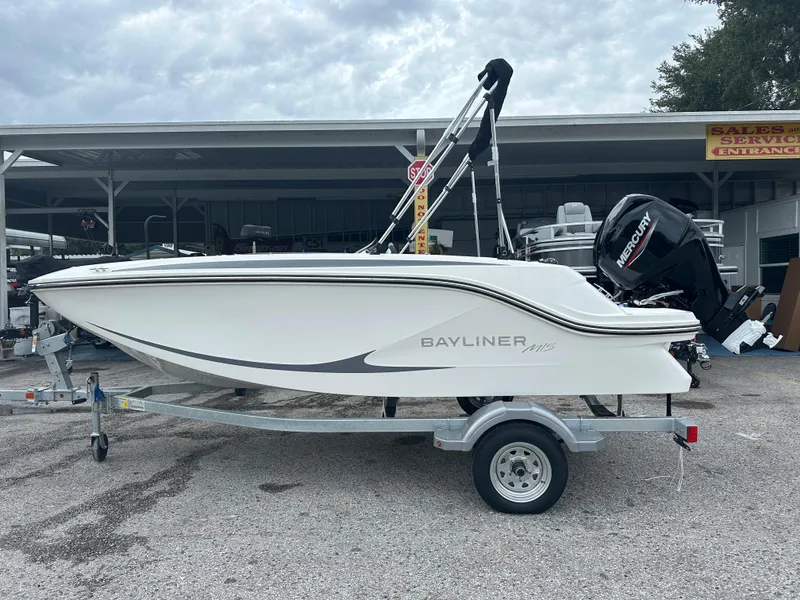 The Image of 2025 Bayliner Element M15 boat on trailer, side view, outdoors. - 0
