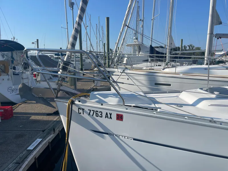 Slide: The Image of 2002 Beneteau 393 sailboat docked at marina with registration number CT 7763 AX. - 2