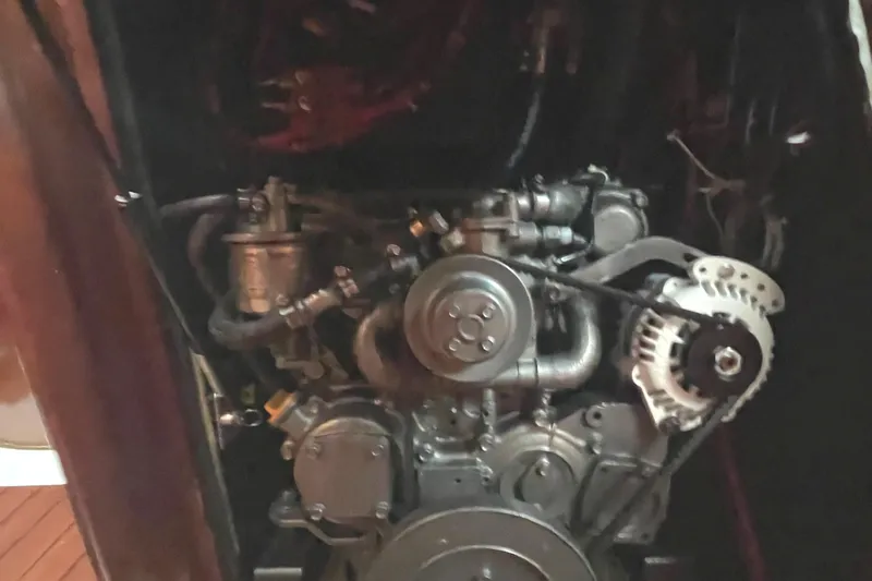 Slide: The Image of Engine compartment of a 2002 Beneteau 393 sailboat. - 22