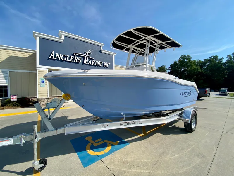 Slide: The Image of 2024 Robalo R180 Center Console boat on trailer at Anglers Marine NC. - 4