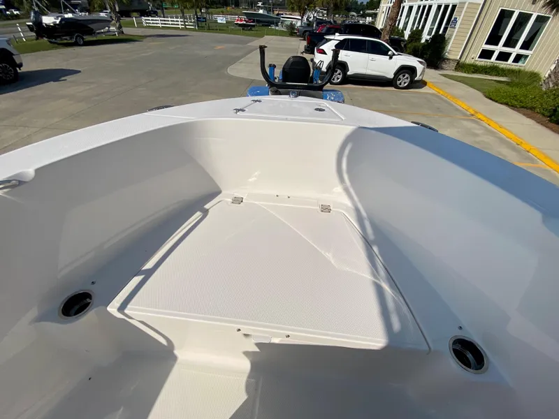 Slide: The Image of 2024 Robalo R180 Center Console boat interior, bow seating area. - 16
