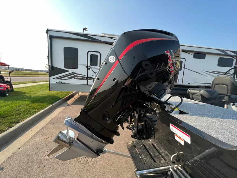 Slide: The Image of 2024 Tracker Targa V19 boat with powerful outboard motor. - 4