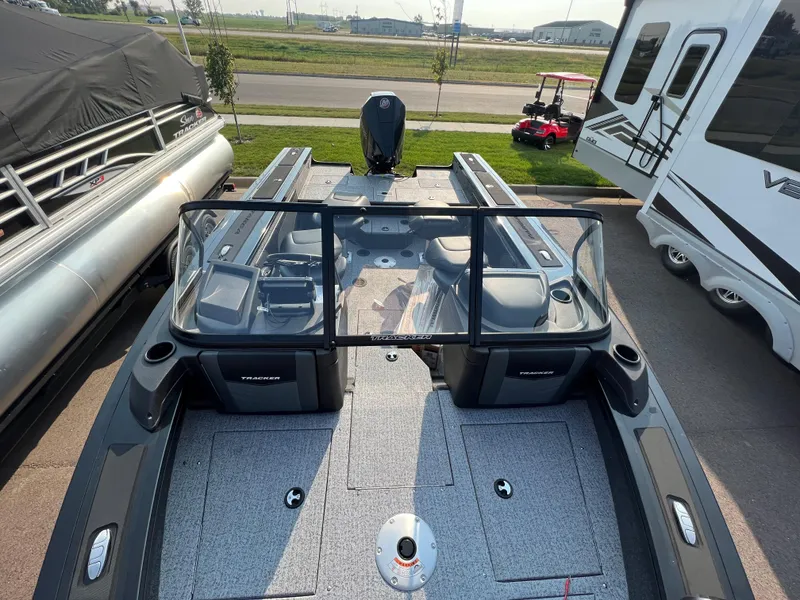 Slide: The Image of 2024 Tracker Targa V19 boat with spacious deck and windshield. - 6