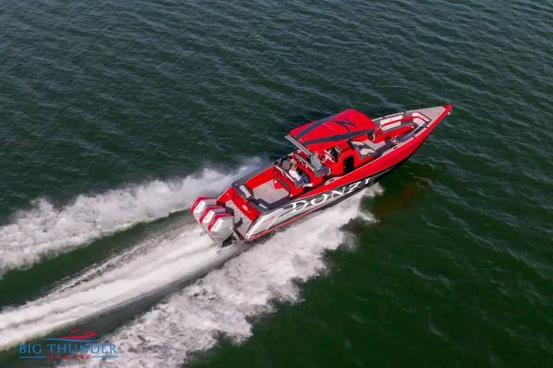 Slide: The Image of 2024 Donzi 39 VRZ speedboat cruising on open water. - 14