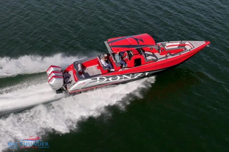 Slide: The Image of 2024 Donzi 39 VRZ speedboat cruising on water. - 15