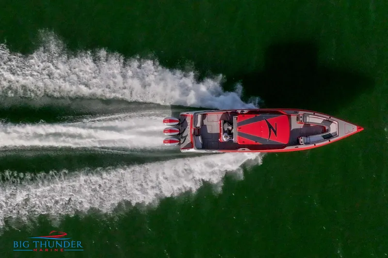 Slide: The Image of Aerial view of 2024 Donzi 39 VRZ speedboat on water. - 16
