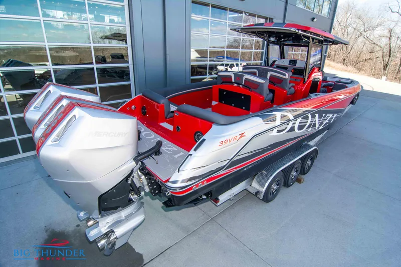 Slide: The Image of 2024 Donzi 39 VRZ boat with triple Mercury outboard engines. - 22