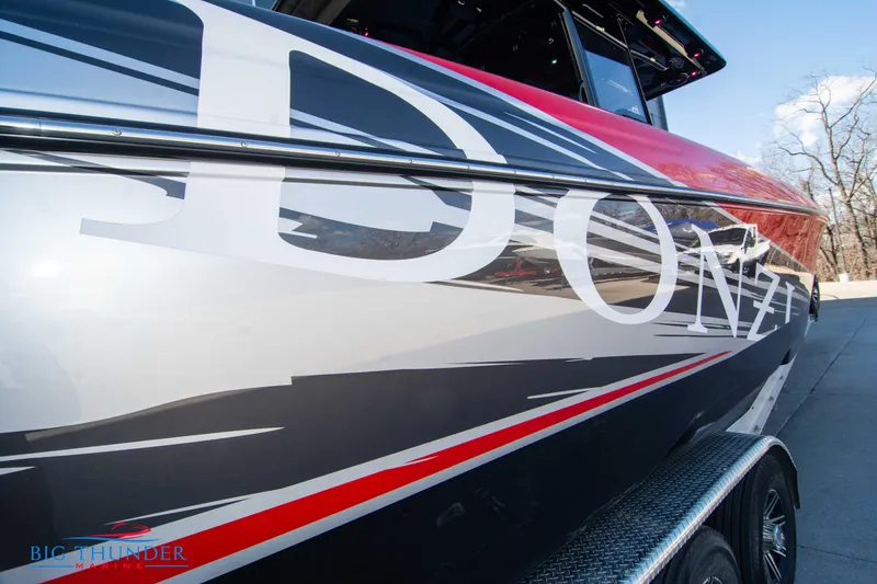 Slide: The Image of 2024 Donzi 39 VRZ boat with sleek graphics and bold design. - 23