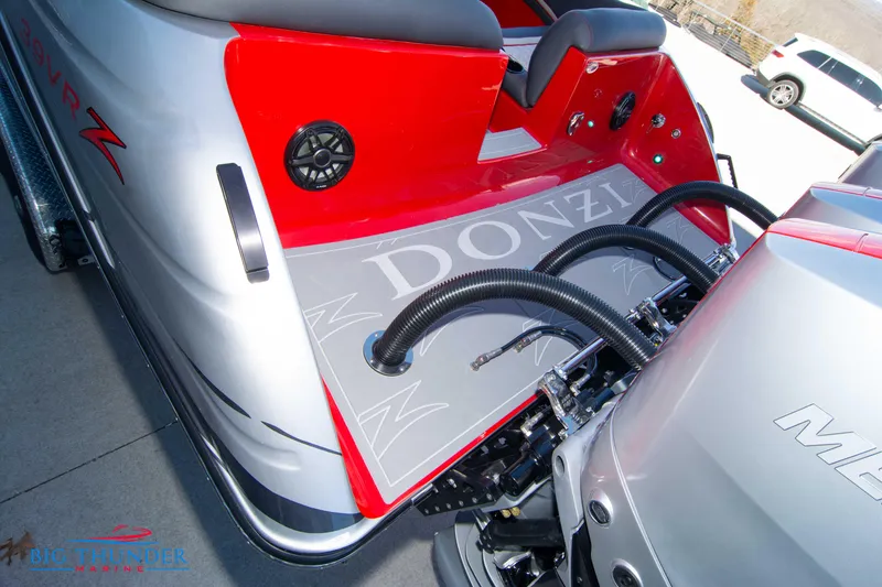 Slide: The Image of 2024 Donzi 39 VRZ boat stern with engine and seating. - 35
