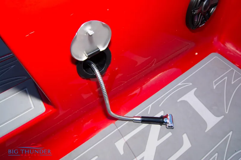 Slide: The Image of 2024 Donzi 39 VRZ boat with red exterior and flexible fuel filler hose. - 37