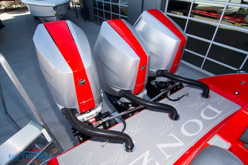 Slide: The Image of 2024 Donzi 39 VRZ with triple Mercury outboard engines. - 38