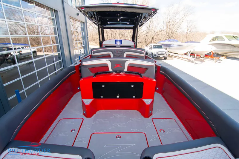 Slide: The Image of 2024 Donzi 39 VRZ boat interior with red and gray seating. - 39