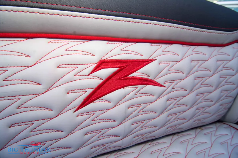 Slide: The Image of 2024 Donzi 39 VRZ boat seat with red stitching and logo. - 43