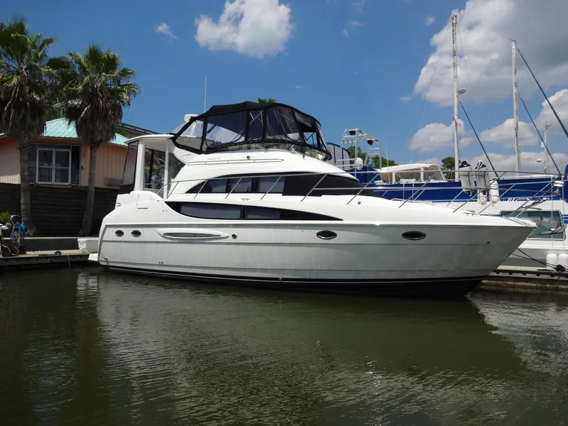 Slide: The Image of 2004 Meridian 408 Motoryacht docked at marina on a sunny day. - 12
