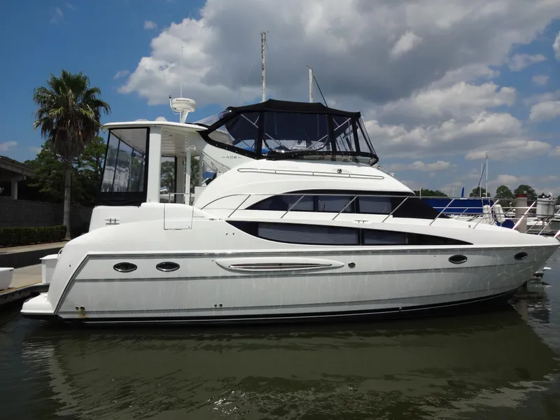 Slide: The Image of 2004 Meridian 408 Motoryacht docked on a sunny day. - 7