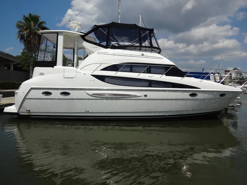Slide: The Image of 2004 Meridian 408 Motoryacht docked at marina. - 9