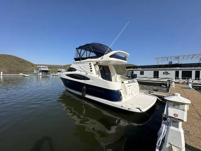 Slide: The Image of 2010 Regal 4080 Flybridge yacht docked at a marina. - 3