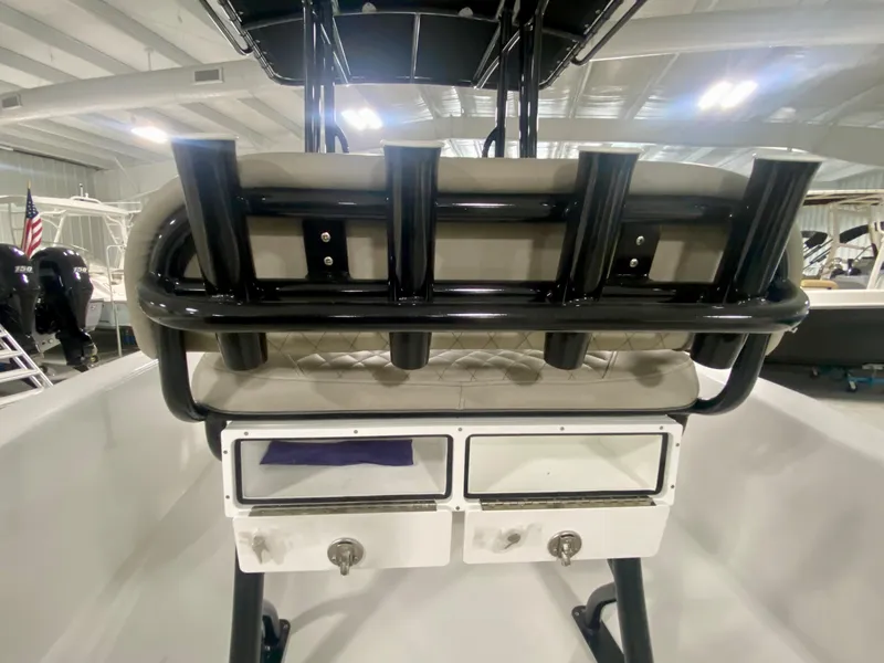 Slide: The Image of 2024 Savannah SS21 boat interior with rod holders and storage compartments. - 10