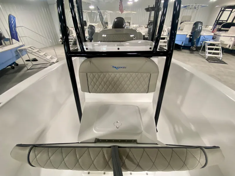 Slide: The Image of 2024 Savannah SS21 boat interior with cushioned seating and storage compartment. - 17