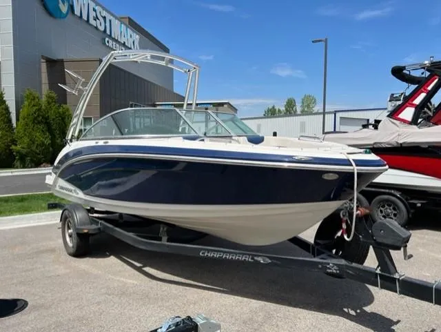 Slide: The Image of 2015 Chaparral 203VR boat on trailer, parked outside Westmark building. - 8