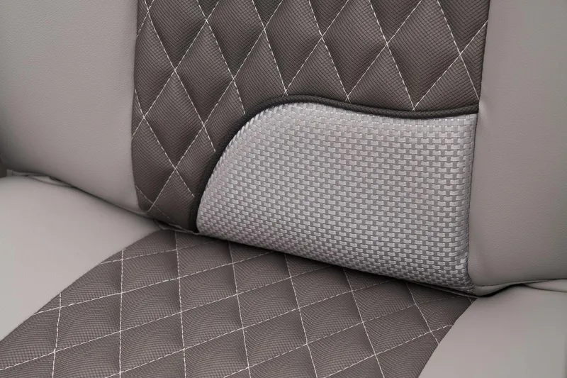 Slide: The Image of 2024 Ranger Reata 223C seat with diamond-stitched upholstery and textured fabric insert. - 32
