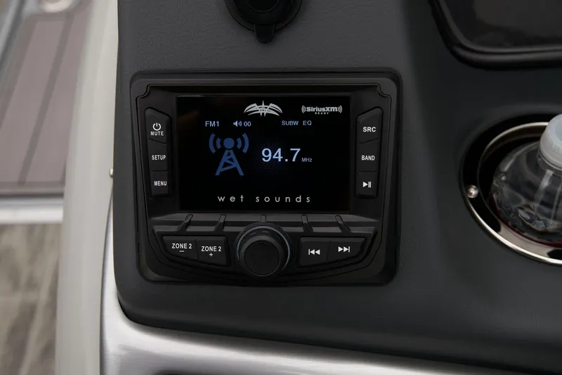 Slide: The Image of 2024 Ranger Reata 223C boat stereo system displaying FM radio. - 40