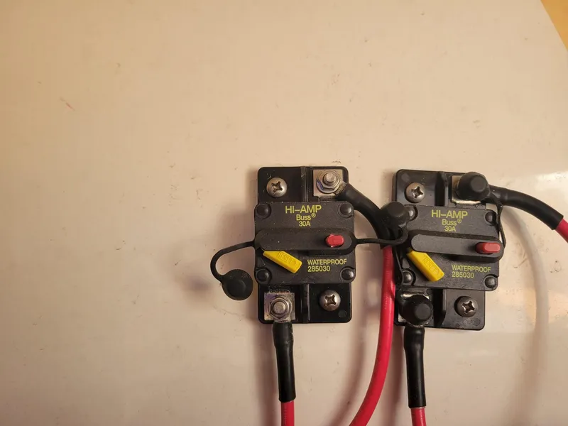 Slide: The Image of Hi-Amp 30A waterproof circuit breakers on a 2018 Key West 281 Billistic boat. - 36