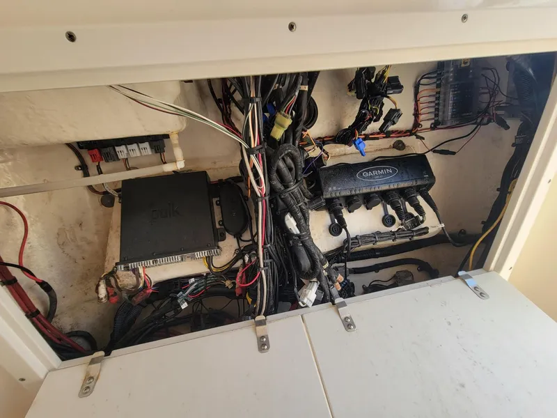 Slide: The Image of 2018 Key West 281 Billistic boat wiring and electronics compartment. - 39