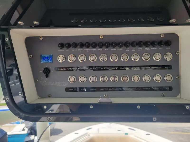 Slide: The Image of Control panel of a 2018 Key West 281 Billistic boat. - 9