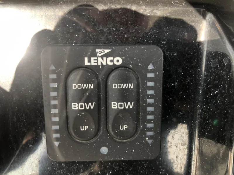 Slide: The Image of Control panel for Lenco trim tabs on a 2019 Wellcraft 242 Fisherman boat. - 21