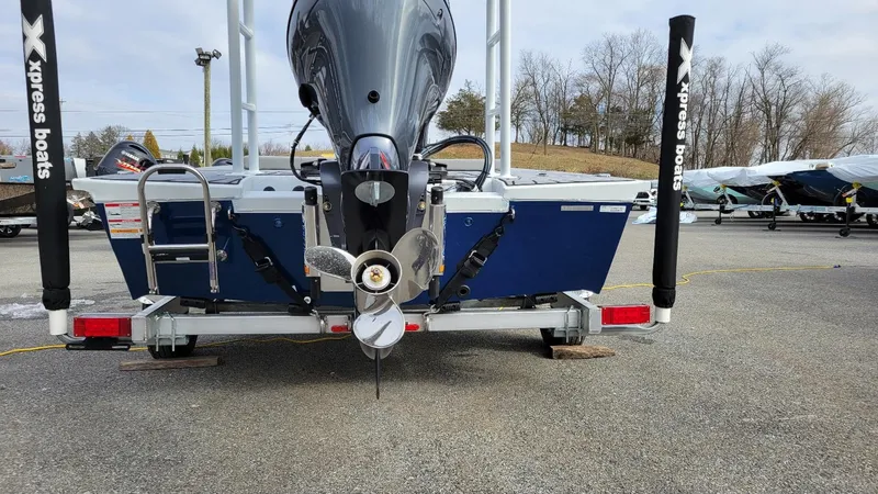 Slide: The Image of 2025 Xpress Skiff 185 with Yamaha Vmax 115 SHO, rear view on trailer. - 14