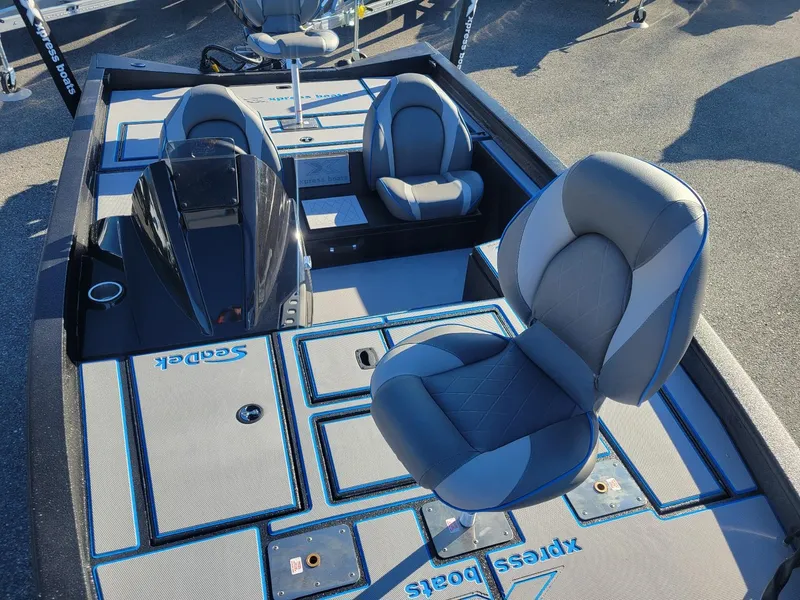 Slide: The Image of 2024 Xpress H18C Crappie Edition boat with stylish seating and deck design. - 5