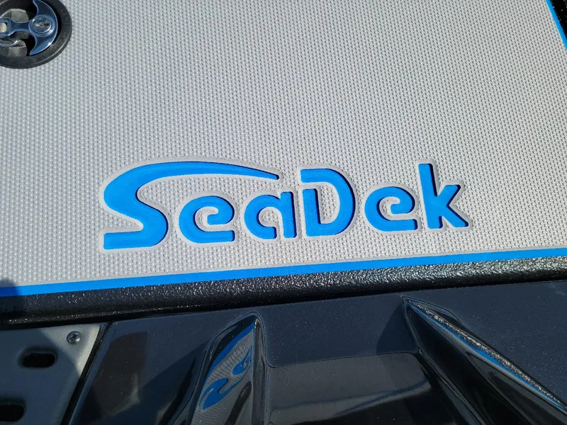 Slide: The Image of SeaDek logo on 2024 Xpress H18C Crappie Edition boat deck. - 9