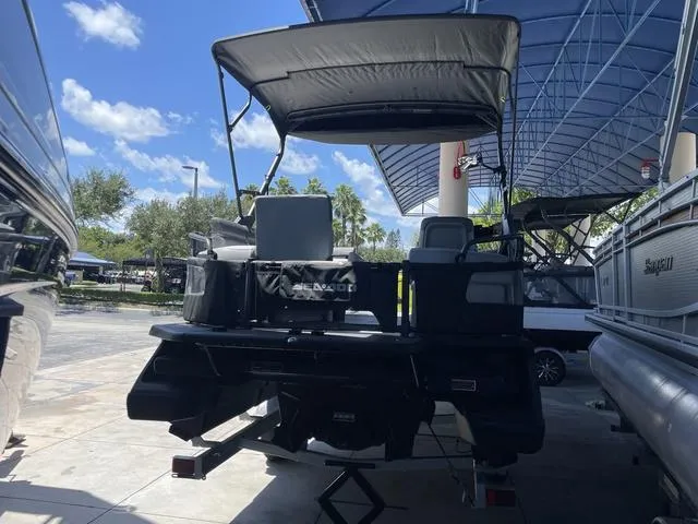 Slide: The Image of 2023 Sea-Doo Switch® Sport 21-230 hp Galvanized pontoon boat under a canopy. - 5