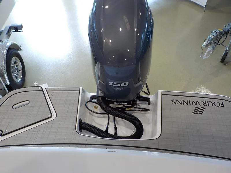 Slide: The Image of 2024 Four Winns H1 OB boat with Yamaha 150 outboard motor. - 20
