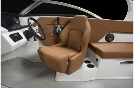 Slide: The Image of 2024 Four Winns H1 OB boat interior with brown leather seats and modern dashboard. - 22