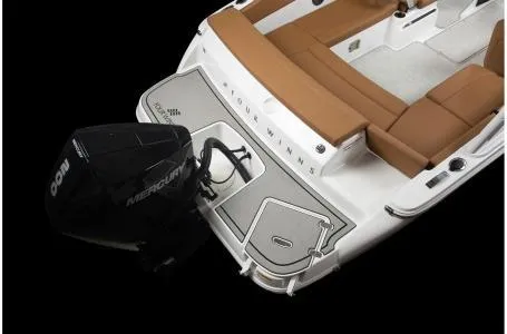 Slide: The Image of 2024 Four Winns H1 OB boat with Mercury outboard motor and tan seating. - 24