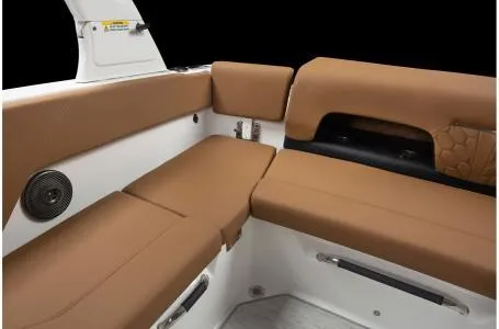 Slide: The Image of 2024 Four Winns H1 OB boat interior with brown leather seating. - 25