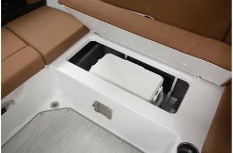 Slide: The Image of 2024 Four Winns H1 OB boat storage compartment with cooler. - 28