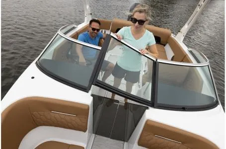 Slide: The Image of 2024 Four Winns H1 OB boat with passengers on a lake. - 32