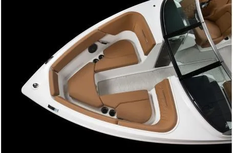 Slide: The Image of 2024 Four Winns H1 OB boat interior with tan seating and black accents. - 5