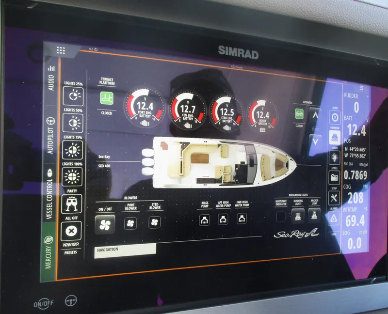 Slide: The Image of Simrad navigation display on 2021 Sea Ray 400 SLX Outboard boat. - 45