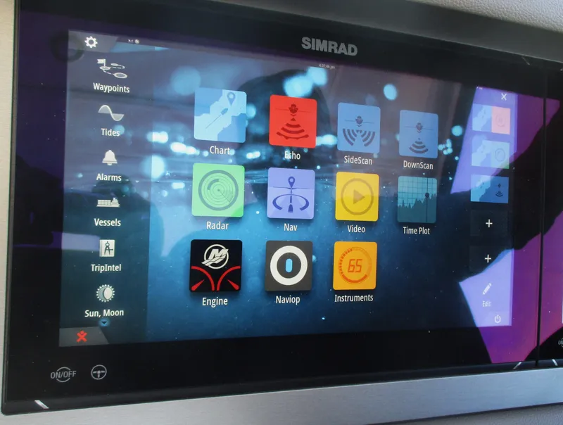 Slide: The Image of Simrad navigation display on 2021 Sea Ray 400 SLX Outboard boat. - 46