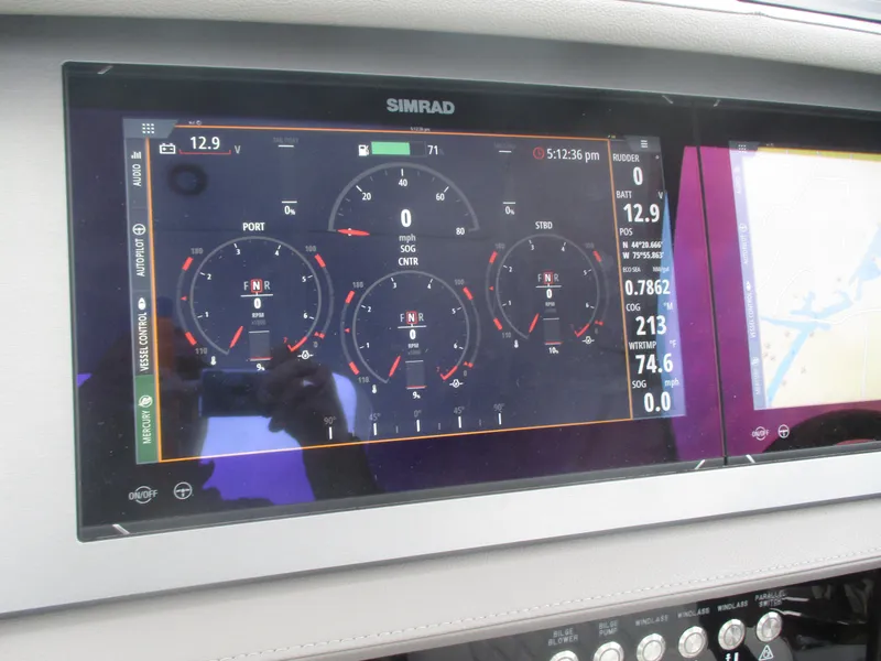 Slide: The Image of Simrad display on 2021 Sea Ray 400 SLX Outboard showing engine and navigation data. - 6